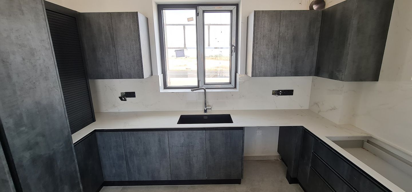 modern kitchen in a Cypriot house with a sink and faucet