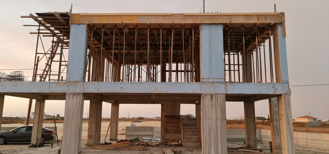 concrete skeleton of a new house under construction in Cyprus